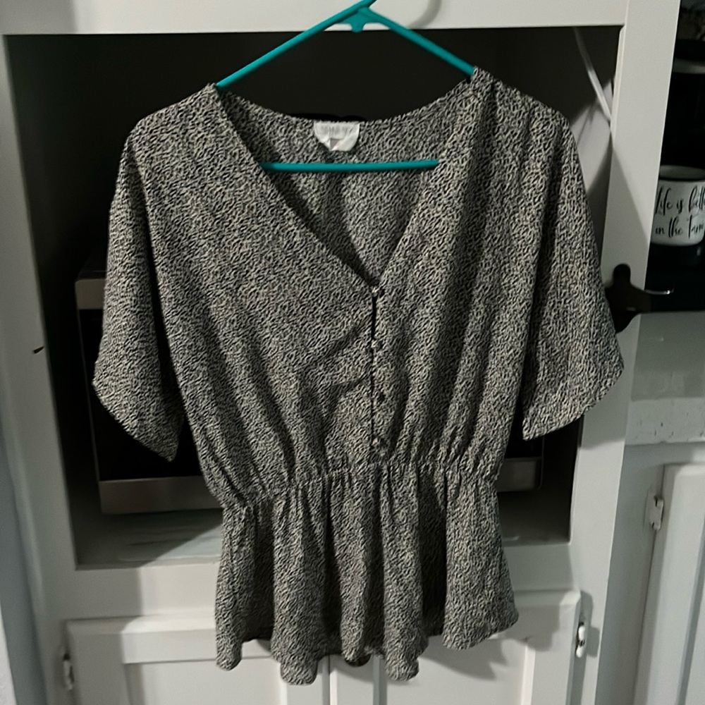 Beige with black speckled spots, polyester, material size medium elastic waist